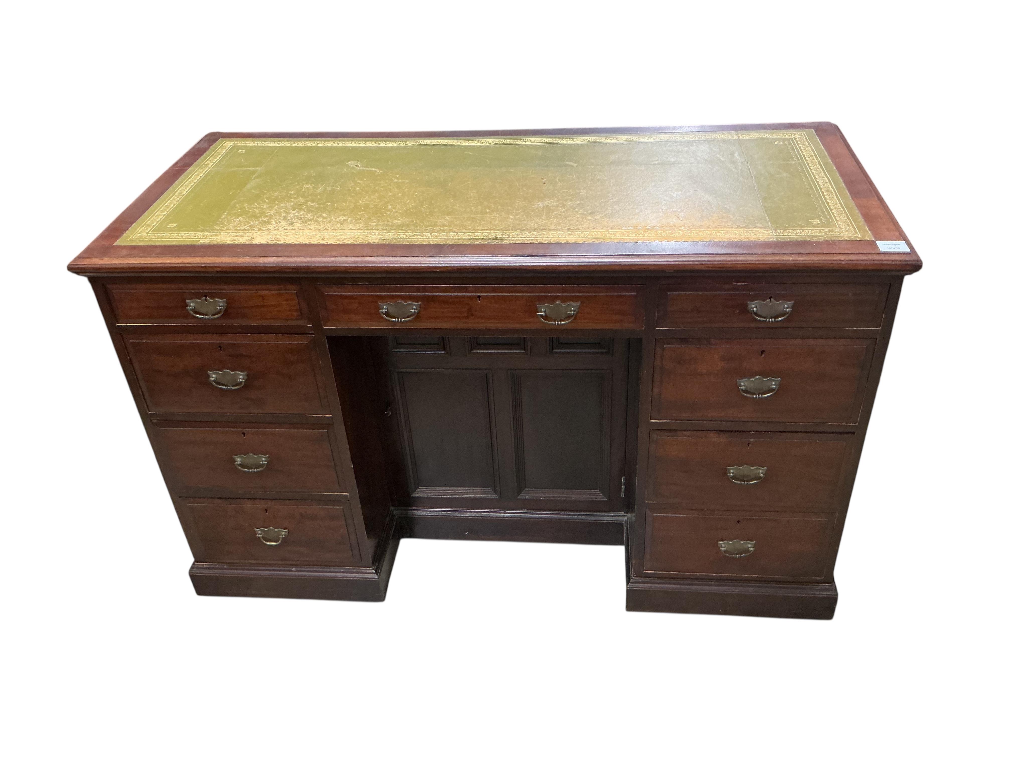 A late Victorian mahogany kneehole desk, width 125, depth 56cm, height 76cm